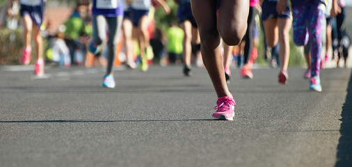 Running children, young athletes run in a kids run race