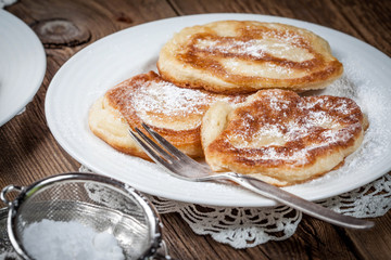 Polish pancakes with powdered sugar.