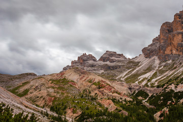 View of Lagazuoi Peaks with beautriful reddish rocks in the upper part of  Travenanzes Valley Dolomites, Italy