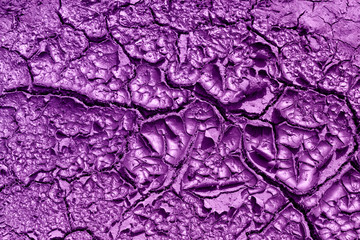 texture of a dry ground painted in purple