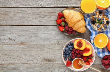 Fresh crusty croissants and orange juice for morning meals
