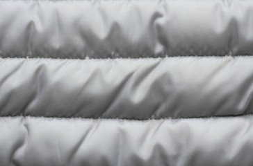 gray warm down jacket texture, textile background