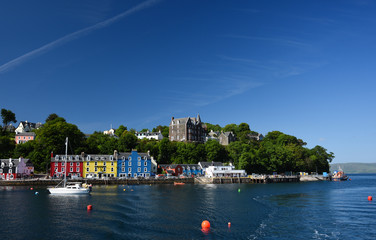 Bright coloured houses in Tobermory Isle of Mull on edge of harbour