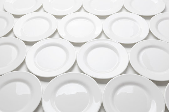 White round plates isolated on white background