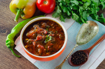 Bowl of traditional soup Borscht on table