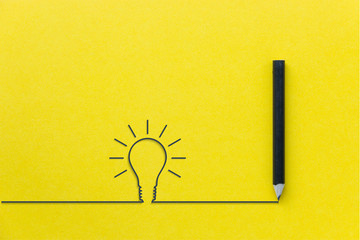 Black pencil on yellow backgroud with light bulb line, Creative ideas concept