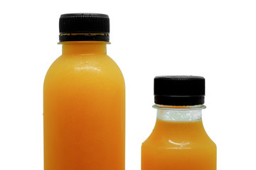 Top bottles of fresh orange juice on white background, healthy drinking concept