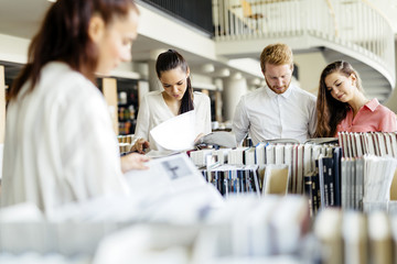 Group of students studying in library