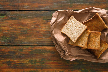 White bread toasts on rustic wood background