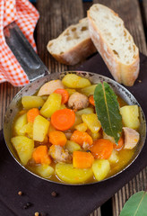 Chicken stew in tomato sauce gravy with vegetables