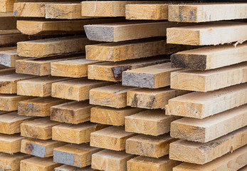 stack of coniferous boards, many building materials pattern a natural base