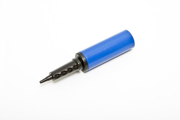 Plastic air pump for pumping balls on a white background.