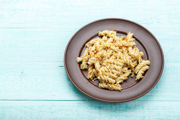 nautically pasta on the wooden background