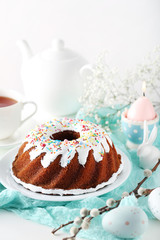 Bundt cake with sprinkles and easter eggs