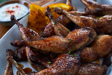 Close up view of tasty grilled poultry legs