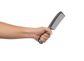 hand holding comb brush,isolated on white background