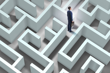 Businessman is trying to escape from maze labyrinth