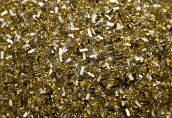 background: Christmas ball, covered with plastic glitter of gold color, shimmering and sparkling, Christmas, wishes, parties, fun, happiness, winter, Italy