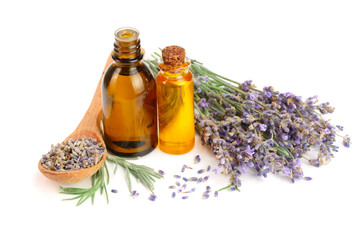 Bottle with aroma oil and lavender flowers isolated on white background