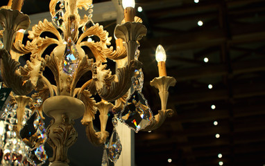 A beautiful chandelier, burning and iridescent..