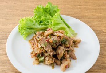 Spicy Grilled Beef Salad on A Table