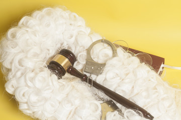 set for judge:judge wig,handclufs, judge gavel,book end eyeglasses