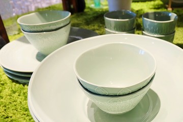 Collection of Green Ceramic Bowls and Plates