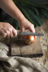 Slicing onions in the kitchen
