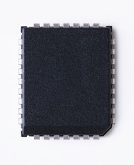 Microchip isolated on neutral background.