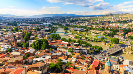 Panoramic view of Tbilisi city from the Narikala Fortress, old town and modern architecture. Tbilisi the capital of Georgia © miklyxa