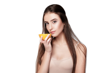 woman with orange on white background