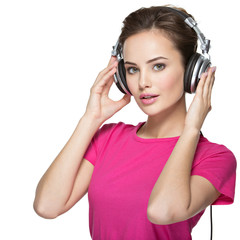girl enjoys listening to music on headphones