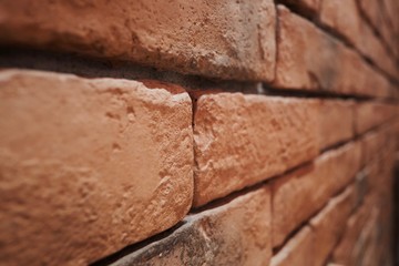 Close-up orange brick wall