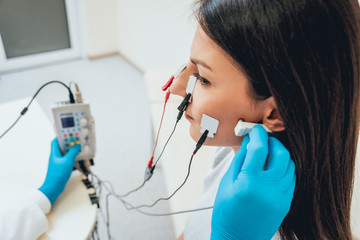 Patient nerves testing using electromyography. EMG