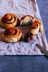 Buns of cinnamon on a gray vintage background.