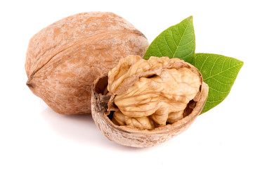 Walnuts with leaf isolated on white background