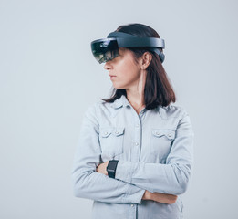 Woman wearing augmented reality goggles.