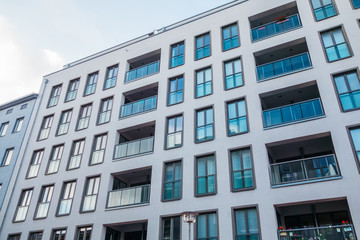 white apartment building on a cold day