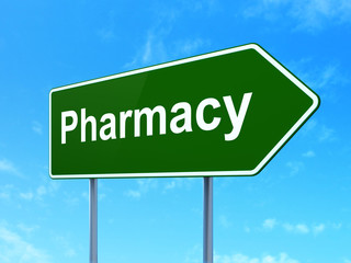 Medicine concept: Pharmacy on green road highway sign, clear blue sky background, 3D rendering