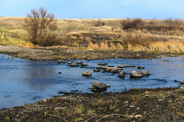 Fototapeta na wymiar A stone crossing over the river.