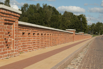 old Brick bridge across the River Venta in the city of Kuldiga Latvia
