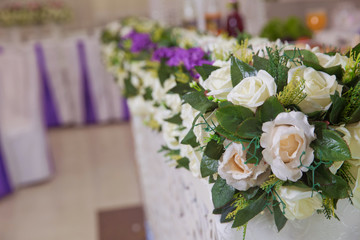 Wedding flowers decoration in the restaurant . Background of Beautiful decor wedding ceremony
