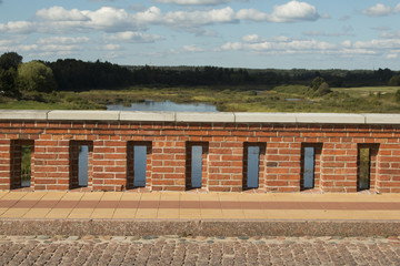 old Brick bridge across the River Venta in the city of Kuldiga Latvia