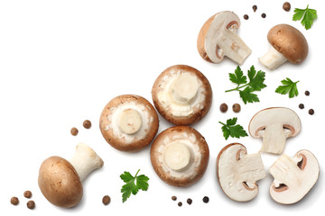 Fresh champignon mushrooms with parsley isolated on white background. top view
