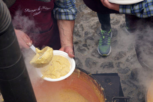 RANGO, ITALY - DECEMBER 8, 2017 - People at traditional christmas market