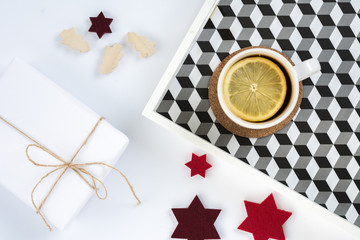 Simple minimalistic flat lay christmas scene with tea