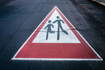 pedestrians traffic sign on a street