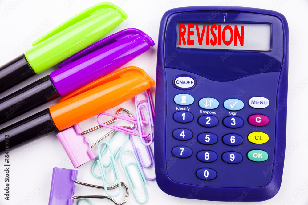 Fototapete writing word revision text in the office with surroundings marker, pen writing on calculator. busine