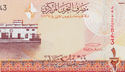 Old Bahrain Court in Manama on Bahrain half dinar (2006) banknote closeup macro, Bahraini money close up