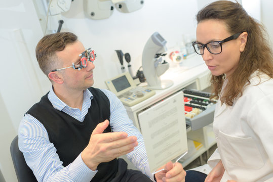 patient readng text during opticians eye-test
